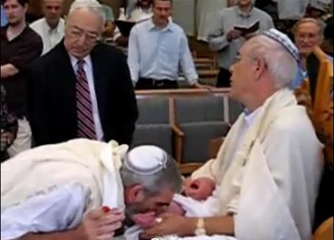 … then the rabbi sucks on the bloody wounded penis.