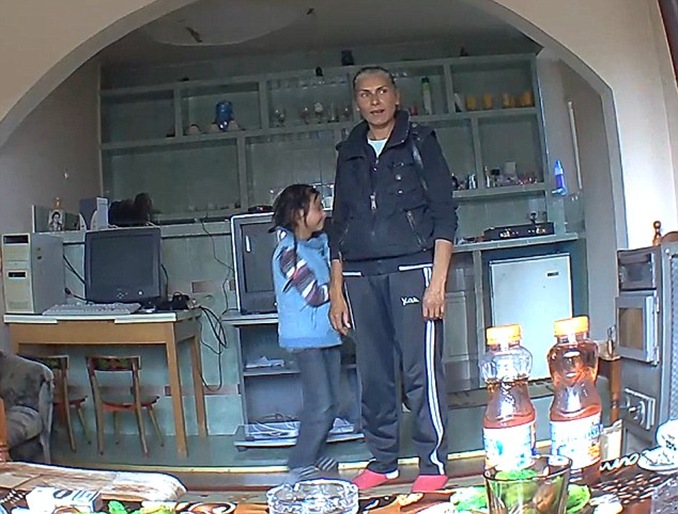 Homework as the child practices stealing at home with mother