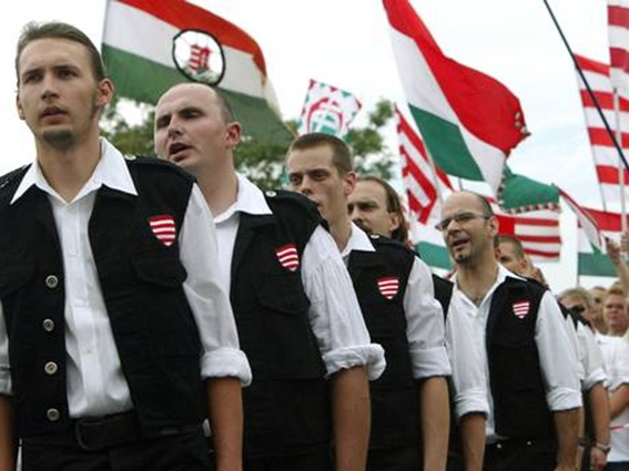 Members of Jobbik take an oath to join the Magyar Garda, a group pledging to 'defend Hungary physically, morally and mentally Members of Jobbik take an oath to join the Magyar Garda, a group pledging to 'defend Hungary physically, morally and mentally