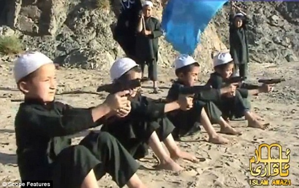 Taliban children as young as five, being trained to fire guns in Afghanistan.