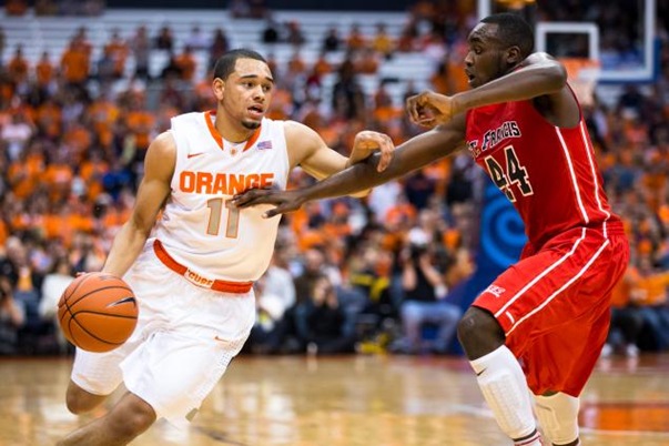 Last year, Anthony White -- who was arrested -- is seen defending Syracuse's Tyler Ennis during a game. Last year, Anthony White -- who was arrested -- is seen defending Syracuse's Tyler Ennis during a game.