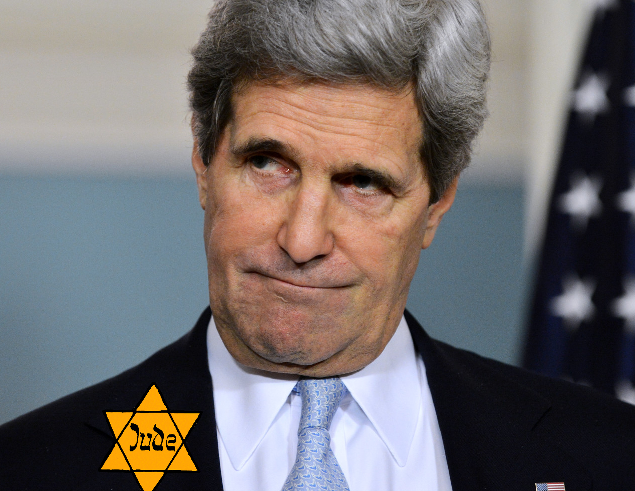 Grotesque plastic surgery-junkie John Kerry (Kohn), presently stationed in the Ukraine to assist his kinsmen in taking down Putin.