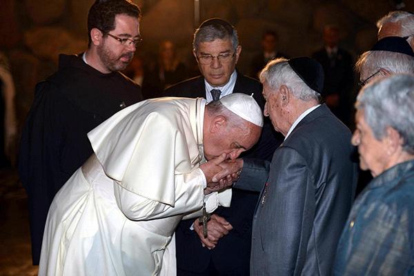 Francis pays tribute to Holohoax "survivors", giving his full endorsement to the idolatry of Jew-worship.