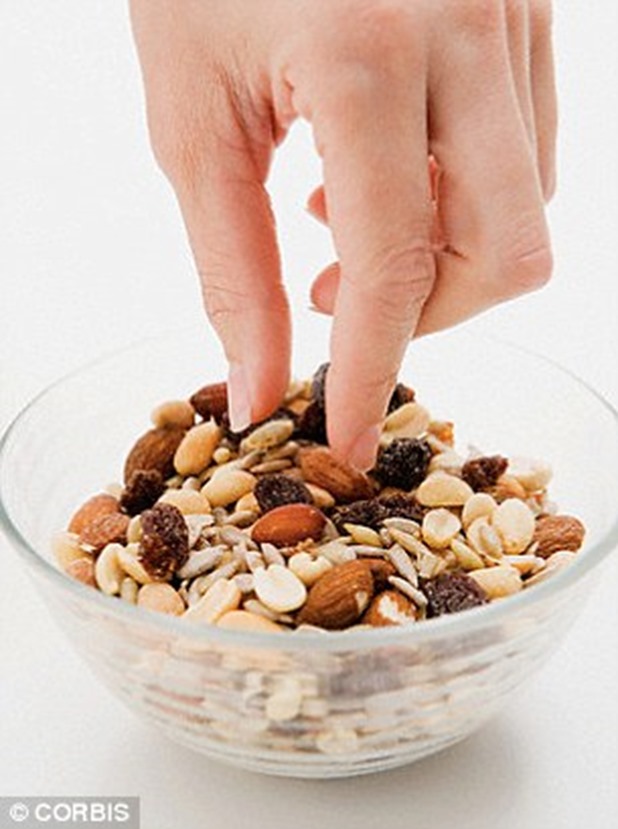 2700CAF100000578-3012093-Nuts_can_cause_some_of_the_strongest_and_most_severe_reactions_a-a-31_1427359501962