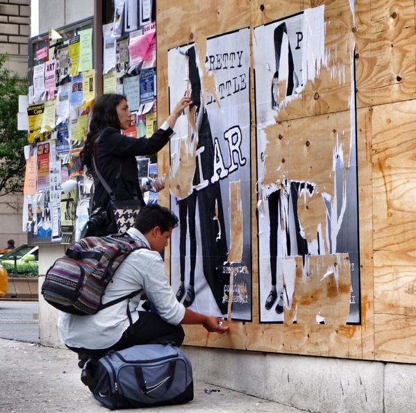 Believers in the rape hoax went out and removed the posters from the streets.