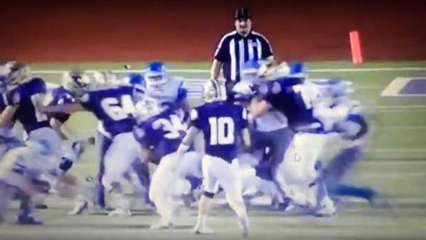 The White referee Robert Watts was physically attacked by three of the Black players.