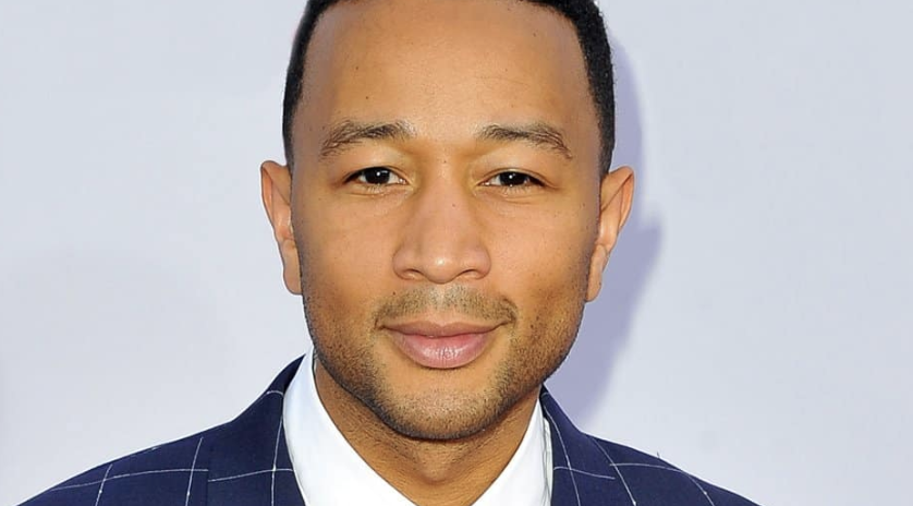 Multitasking Black Social Activist Going Around Hockey-Checking White Women While Pushing Toddler in Stroller